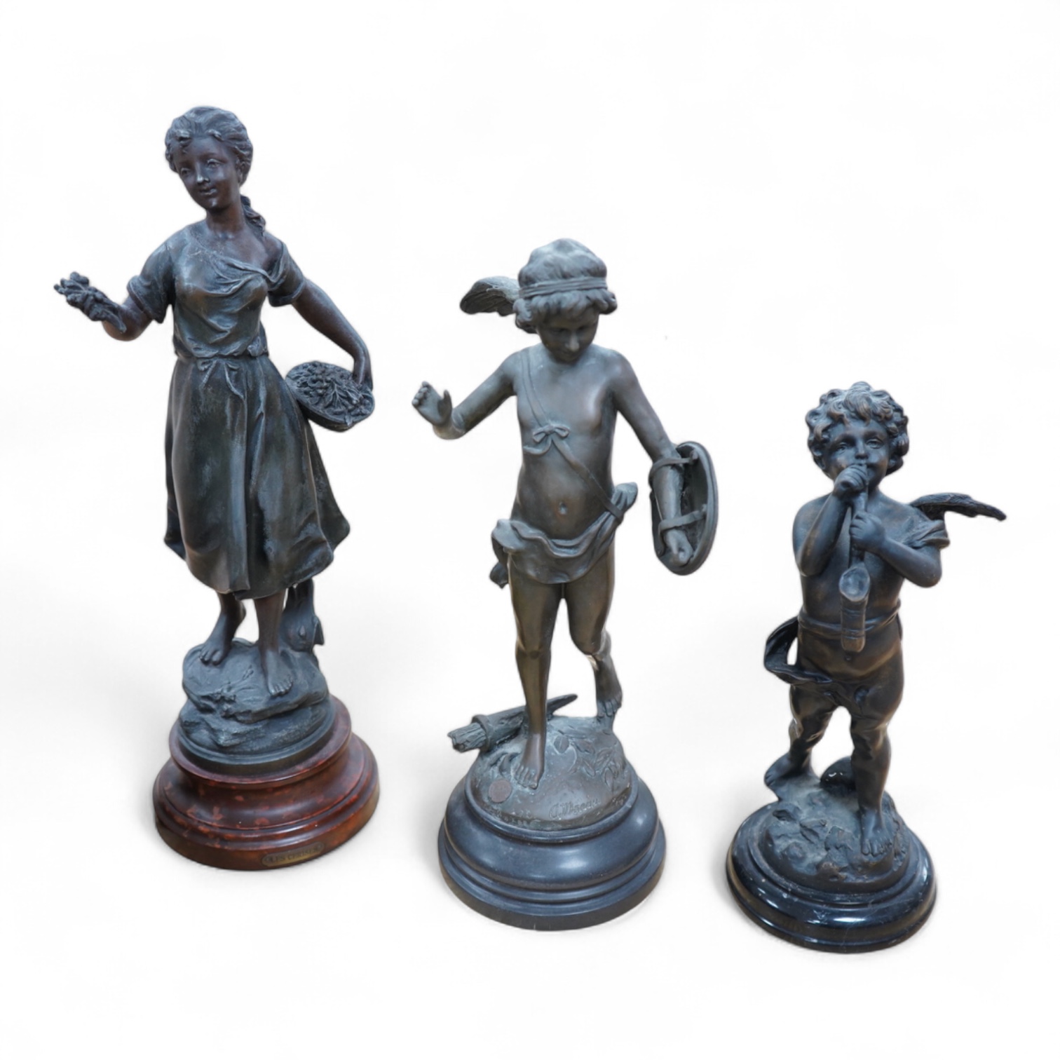 After Moreau - three statuettes, two bronze cherubs and a patinated spelter maiden, ‘Les Cerises’